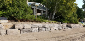 large rock wall, excavation services